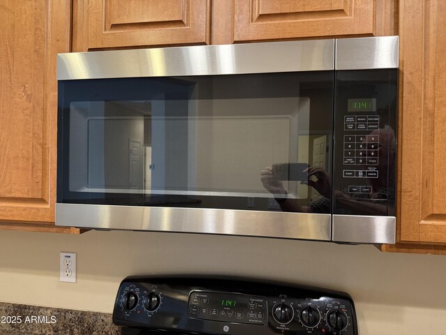 4117 W Allen St, Laveen, AZ 85339 - detailed view of stainless steel microwave and range