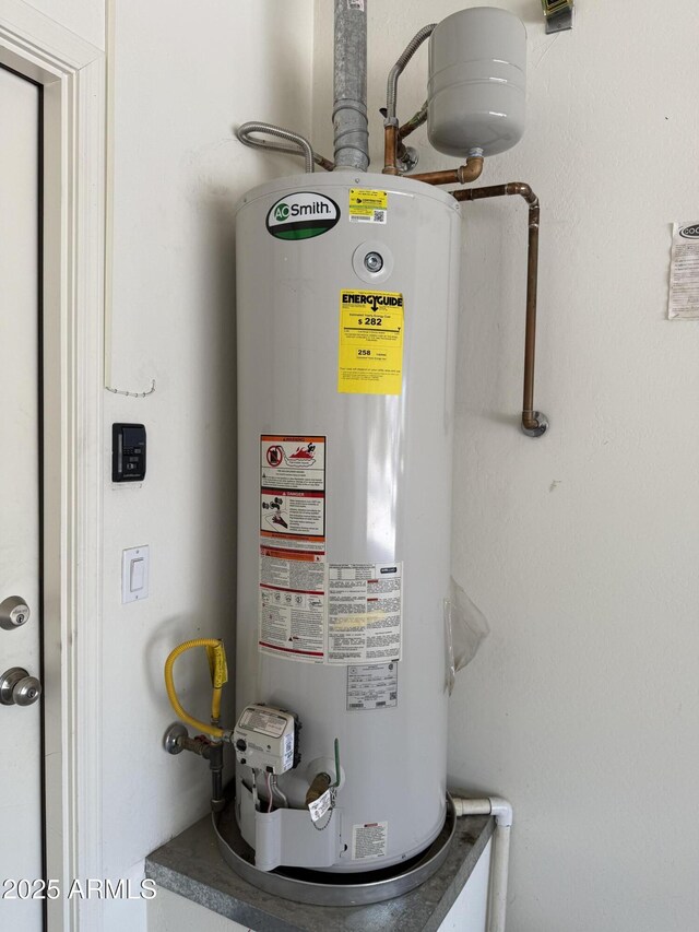 4117 W Allen St, Laveen, AZ 85339 - utility room with water heater