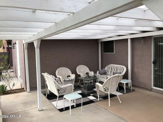 view of patio / terrace featuring outdoor lounge area and a pergola