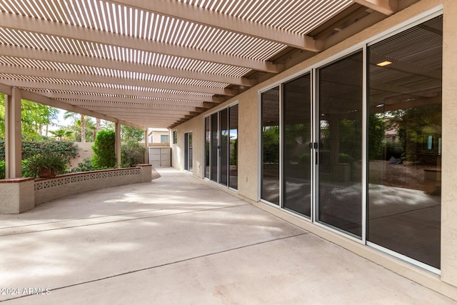 view of patio featuring a pergola