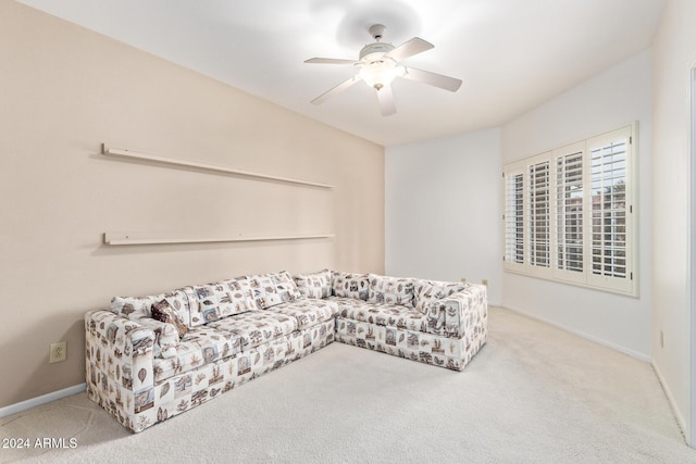 living room with carpet flooring and ceiling fan