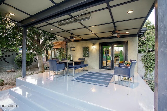 view of patio / terrace with ceiling fan and french doors