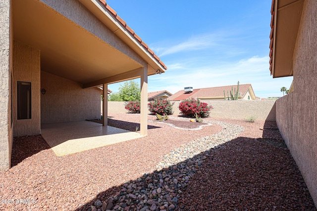 view of yard featuring a fenced backyard and a patio area