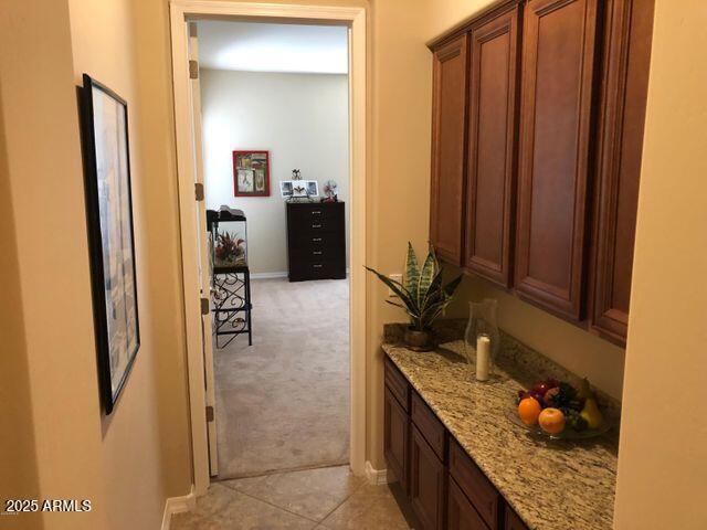 35401 N Via Tramonto St, Phoenix, AZ 85086 - corridor featuring light carpet and baseboards