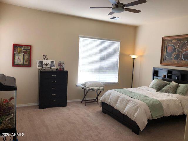 35401 N Via Tramonto St, Phoenix, AZ 85086 - bedroom with light carpet and a ceiling fan