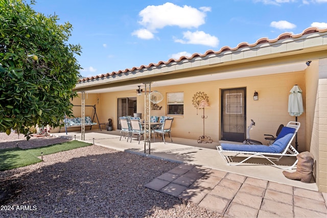 rear view of house featuring a patio area