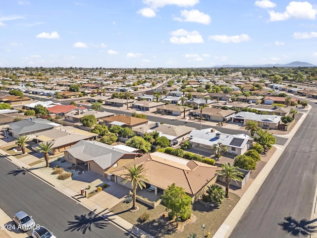 birds eye view of property featuring a mountain view and a residential view