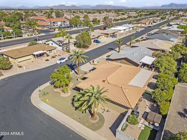 birds eye view of property featuring a mountain view and a residential view
