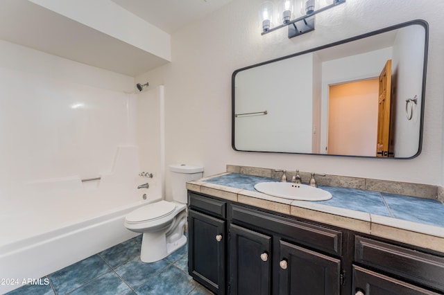 full bathroom featuring tile patterned flooring, shower / tub combination, vanity, and toilet