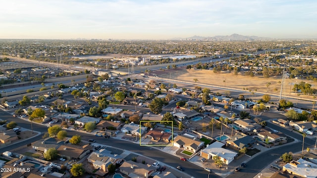 drone / aerial view featuring a mountain view