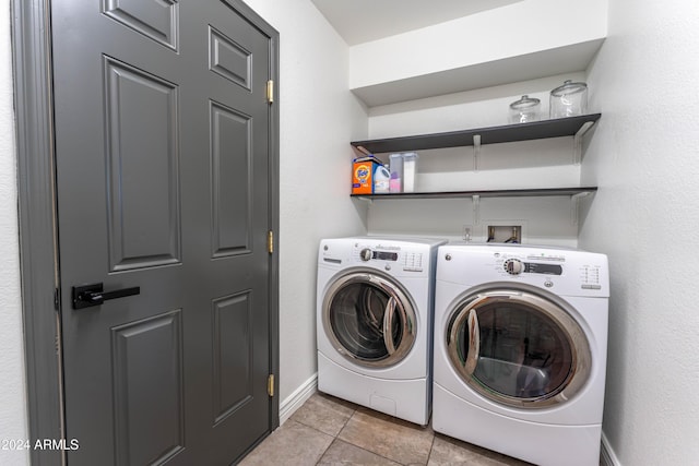 2804 W Curry St, Chandler, AZ 85224 - laundry area featuring washer and clothes dryer, light tile patterned floors, and baseboards