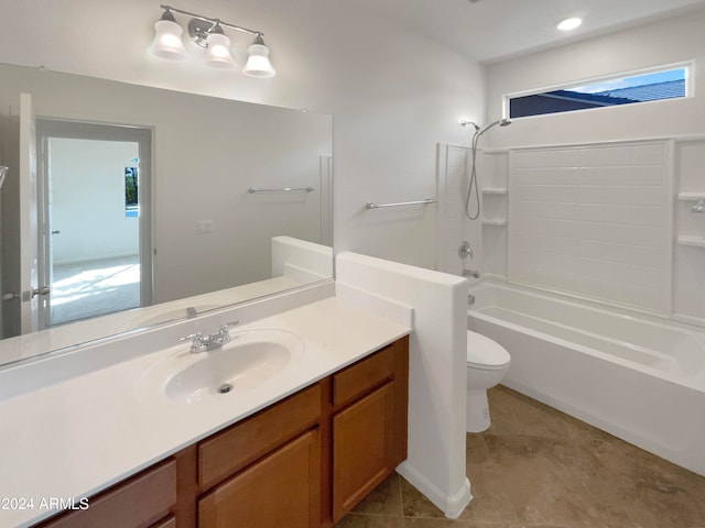 full bathroom featuring vanity, toilet, washtub / shower combination, and tile patterned floors