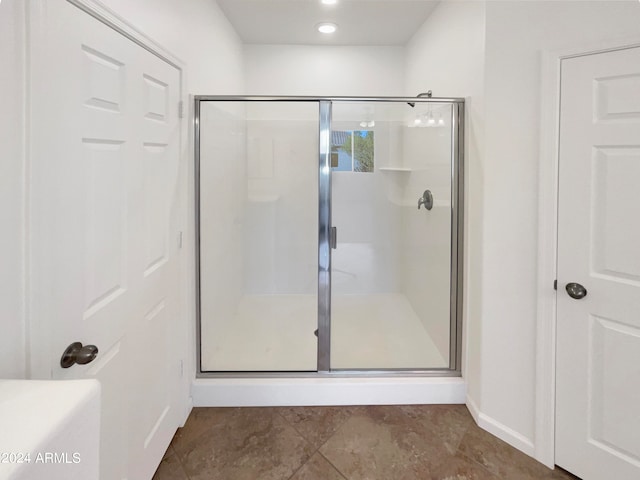 bathroom with an enclosed shower