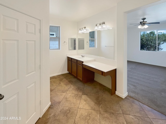 bathroom featuring ceiling fan, vanity, and tile patterned flooring