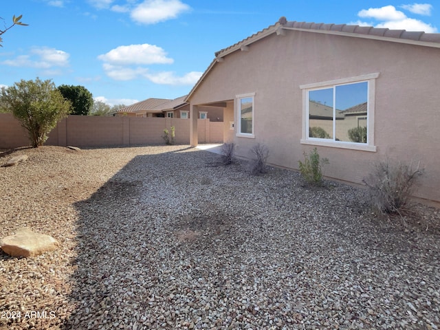 back of house featuring a patio area