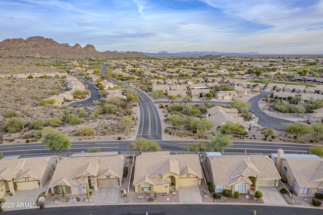 bird's eye view with a mountain view