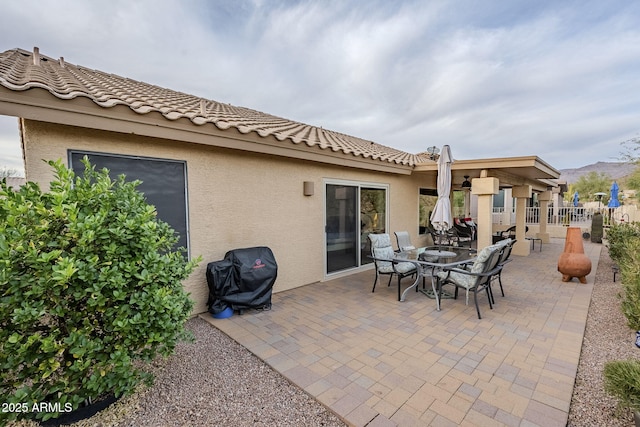 view of patio featuring a grill