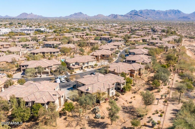 bird's eye view with a residential view and a mountain view