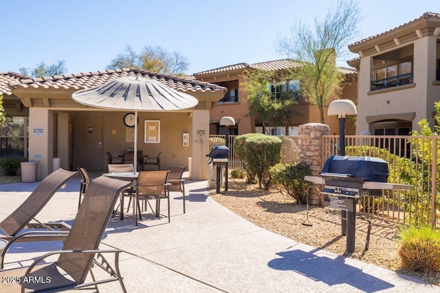 view of patio / terrace with fence and grilling area