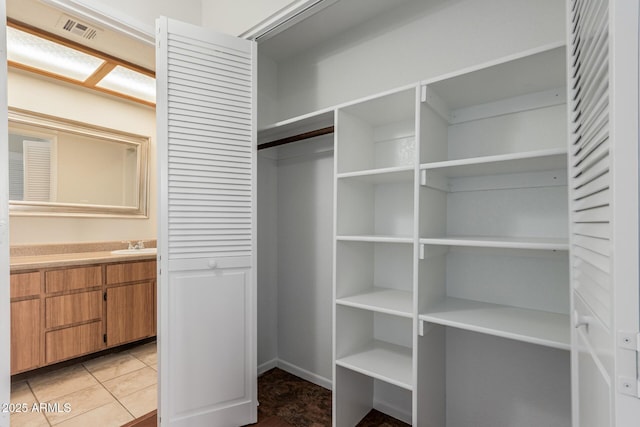 closet featuring visible vents