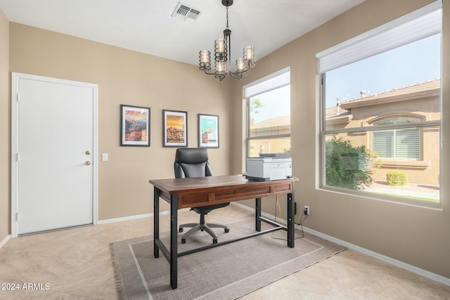 office area with a notable chandelier