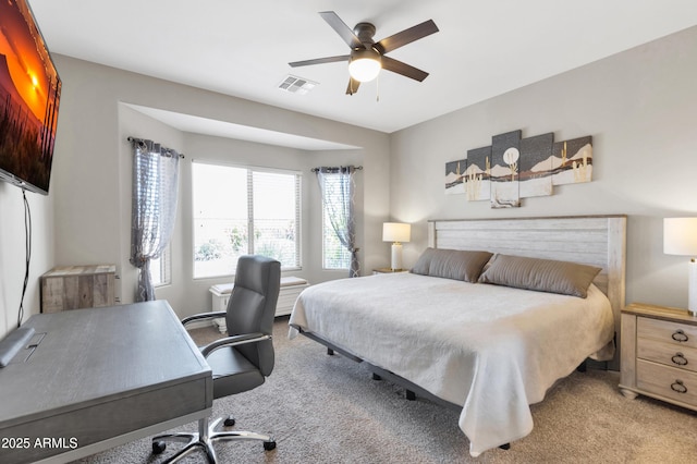 bedroom with carpet floors, a desk, and ceiling fan