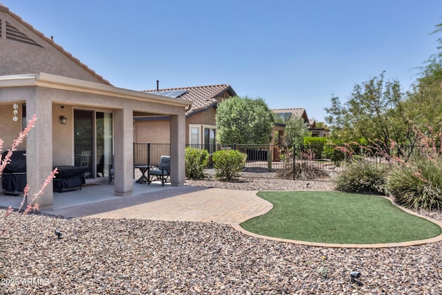 view of yard with a patio area and fence
