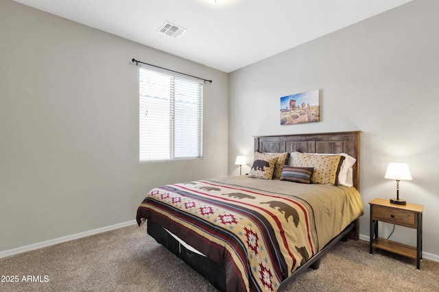 carpeted bedroom with baseboards