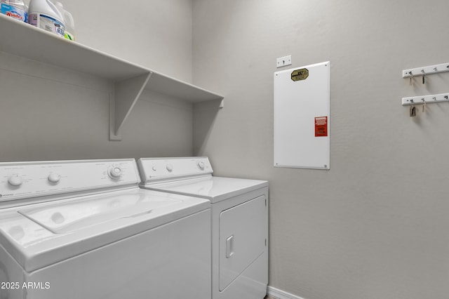 washroom featuring washing machine and dryer