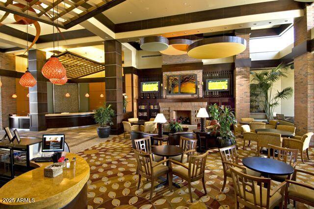 building lobby featuring a towering ceiling
