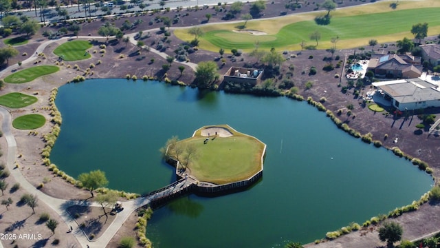 bird's eye view of a nearby body of water and a local golf course