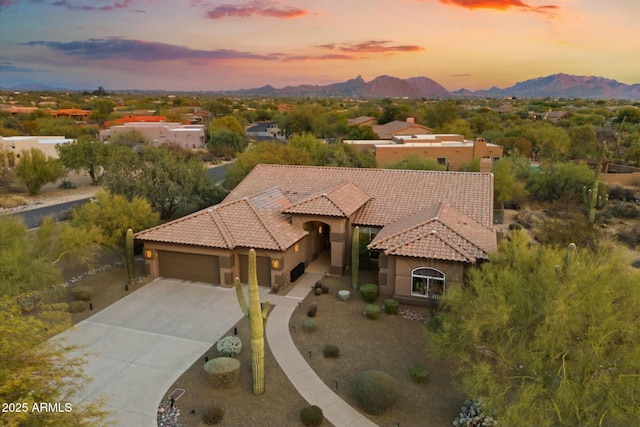 aerial view at dusk with a mountain view