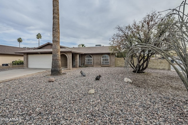 single story home with a garage