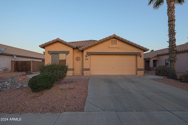 view of front of house with a garage