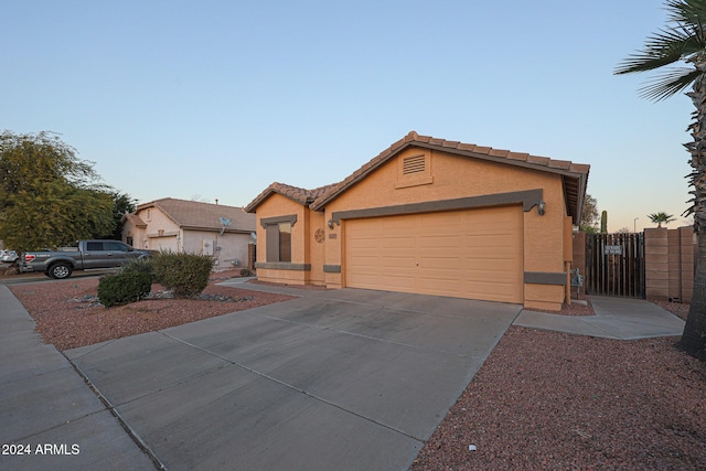 single story home with a garage