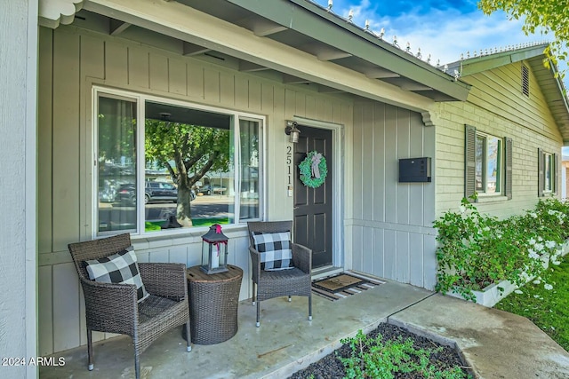 doorway to property with a patio