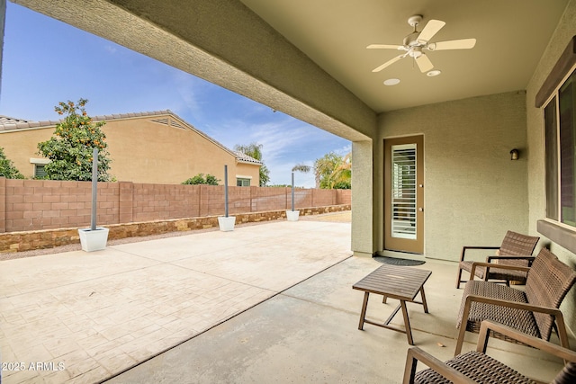 view of patio / terrace featuring ceiling fan