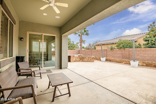 view of patio / terrace with ceiling fan