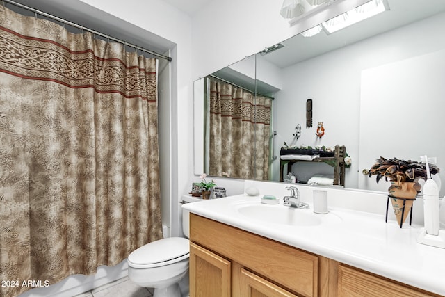 full bathroom featuring shower / bath combination with curtain, vanity, toilet, and tile patterned floors