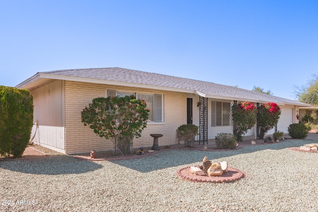 single story home with a garage