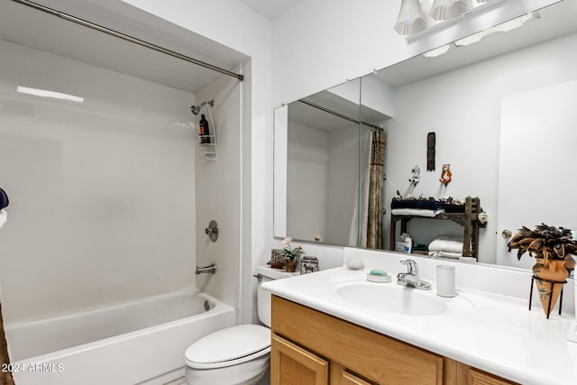 full bathroom with shower / bath combo, vanity, and toilet