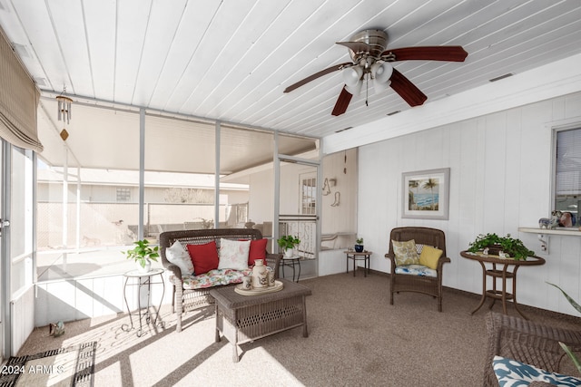 sunroom / solarium with ceiling fan