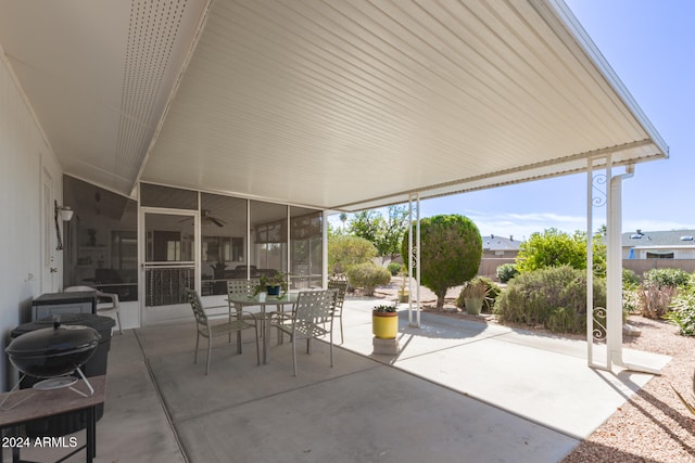 view of patio / terrace with a sunroom