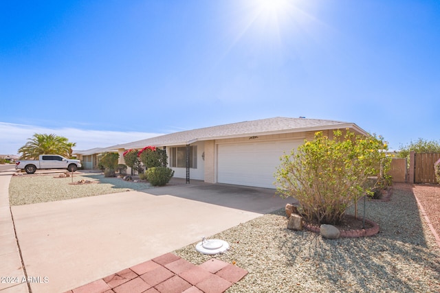 ranch-style home with a garage