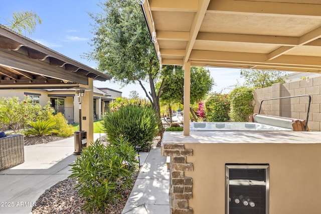 6918 E Ivyglen St, Mesa, AZ 85207 - view of patio featuring beverage cooler