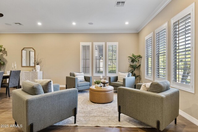 6918 E Ivyglen St, Mesa, AZ 85207 - living area with crown molding, baseboards, and recessed lighting