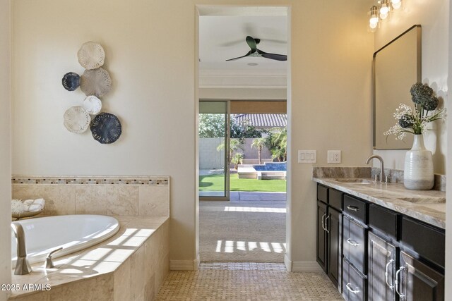 6918 E Ivyglen St, Mesa, AZ 85207 - bathroom with vanity, a bath, baseboards, and ornamental molding
