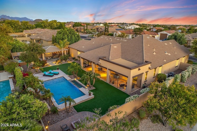 6918 E Ivyglen St, Mesa, AZ 85207 - outdoor pool featuring a residential view and a patio area