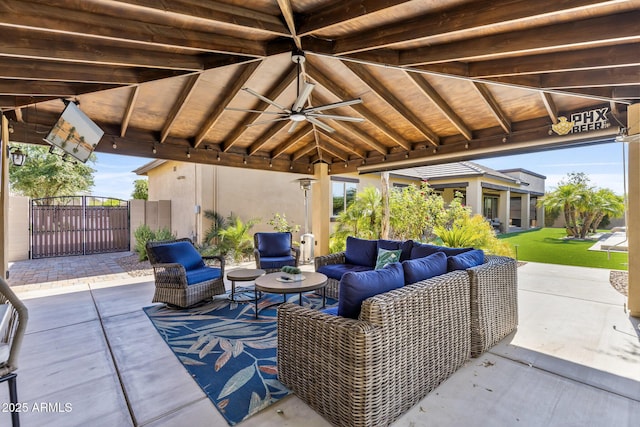 6918 E Ivyglen St, Mesa, AZ 85207 - view of patio featuring ceiling fan, an outdoor hangout area, a gazebo, and a gate