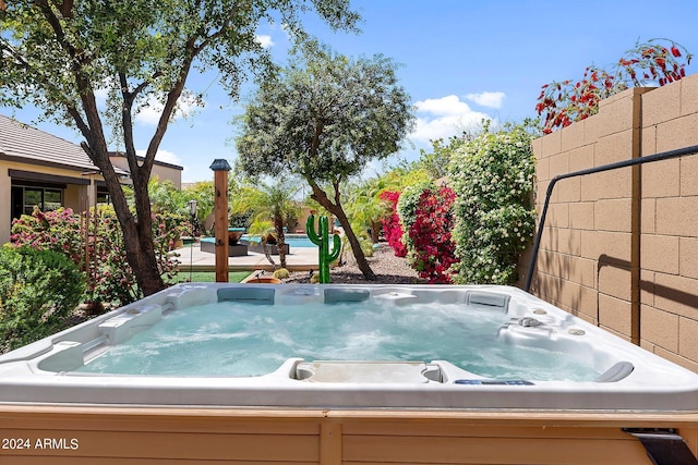 6918 E Ivyglen St, Mesa, AZ 85207 - view of yard with an outdoor hot tub